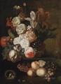 Rosas, tulipanes, violetas y otras flores en una cesta de mimbre sobre una cornisa de piedra con uvas, melocotones y un nido con huevos Jan van Huysum